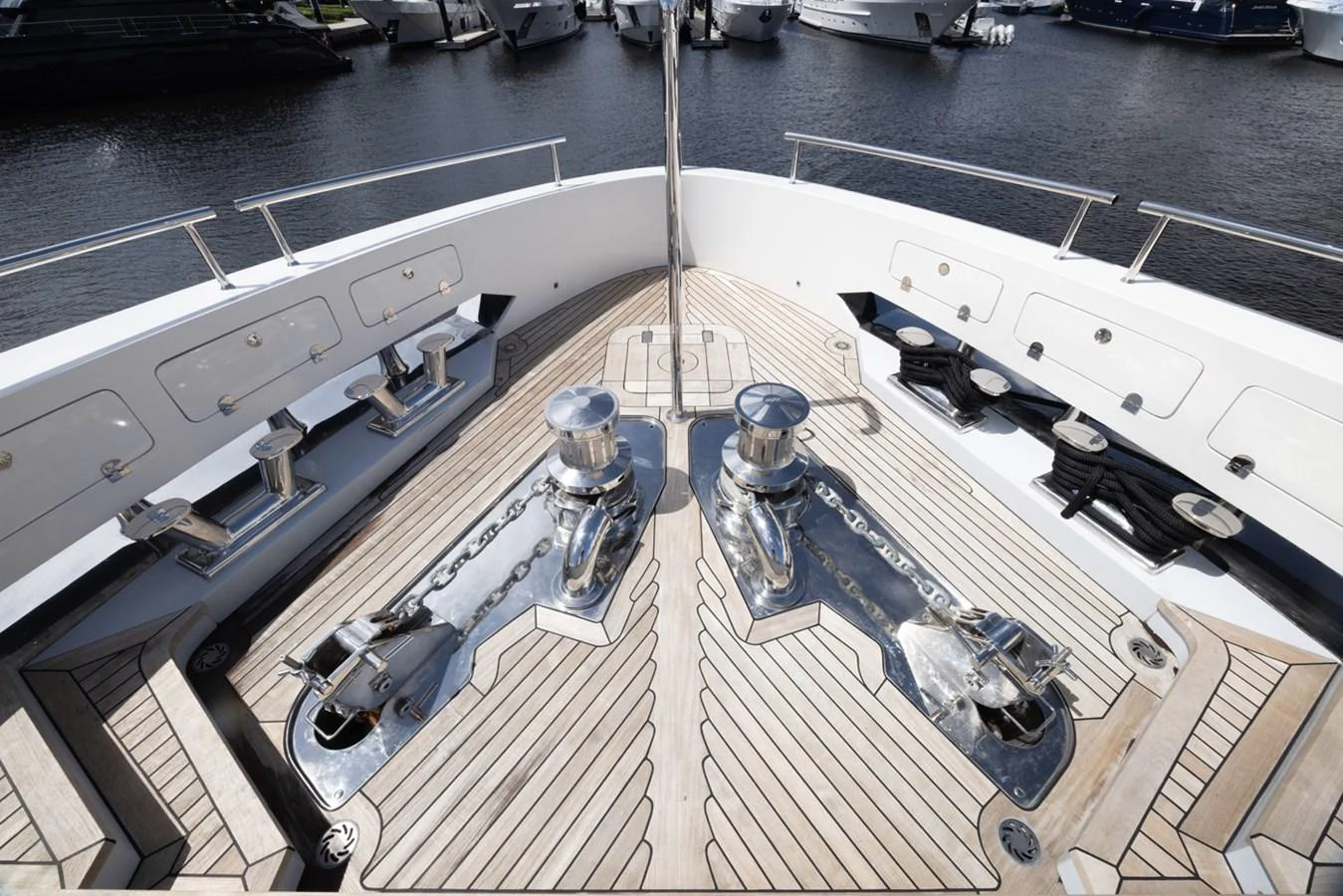 a ship deck with a deck and a deck with a deck and a couple of cars aboard KANDO Yacht for Sale