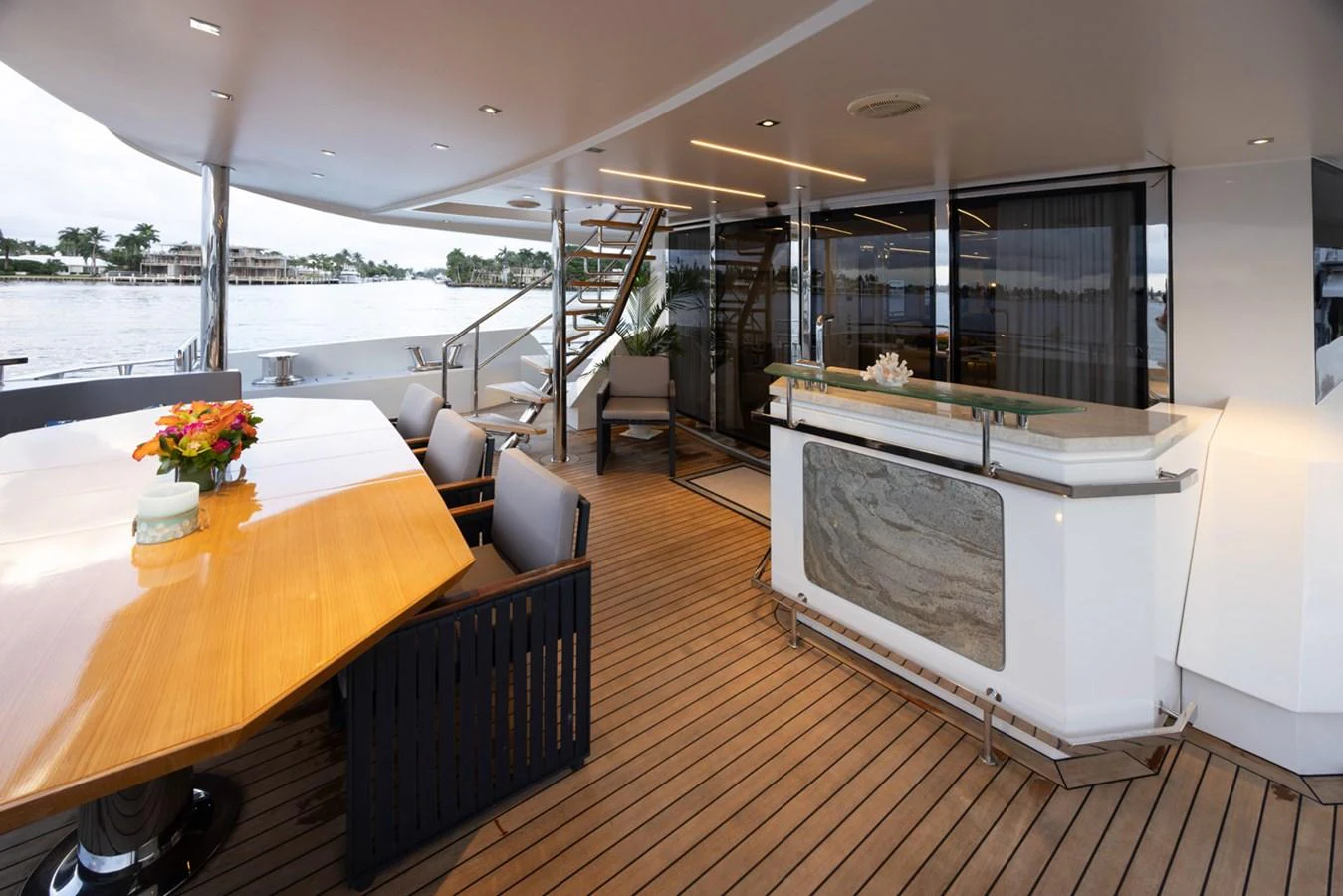 a living room with a large tv aboard KANDO Yacht for Sale