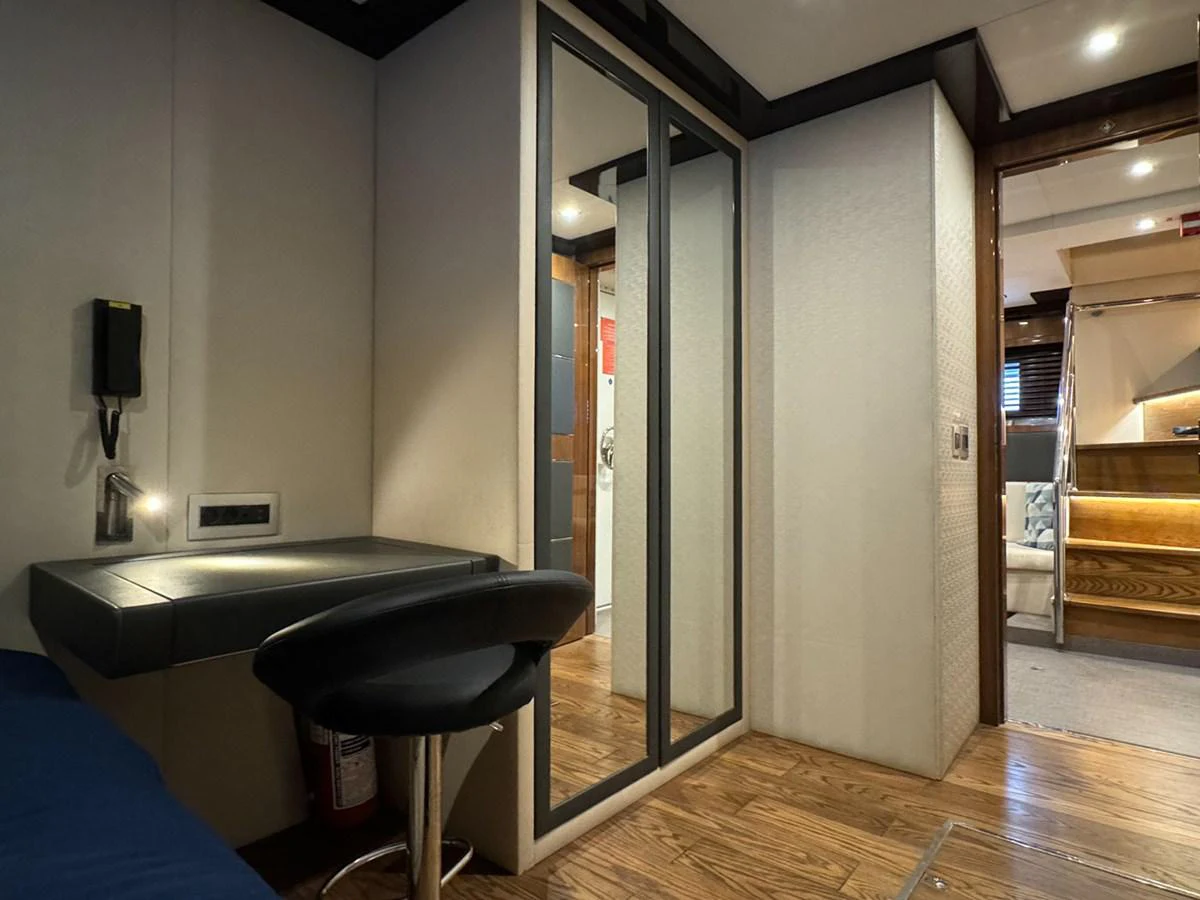 a room with a desk and a chair aboard KANDO Yacht for Sale