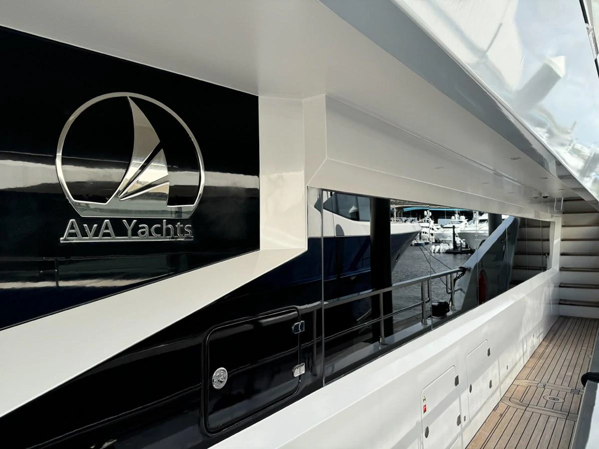 a large silver building with a glass display aboard KANDO Yacht for Sale