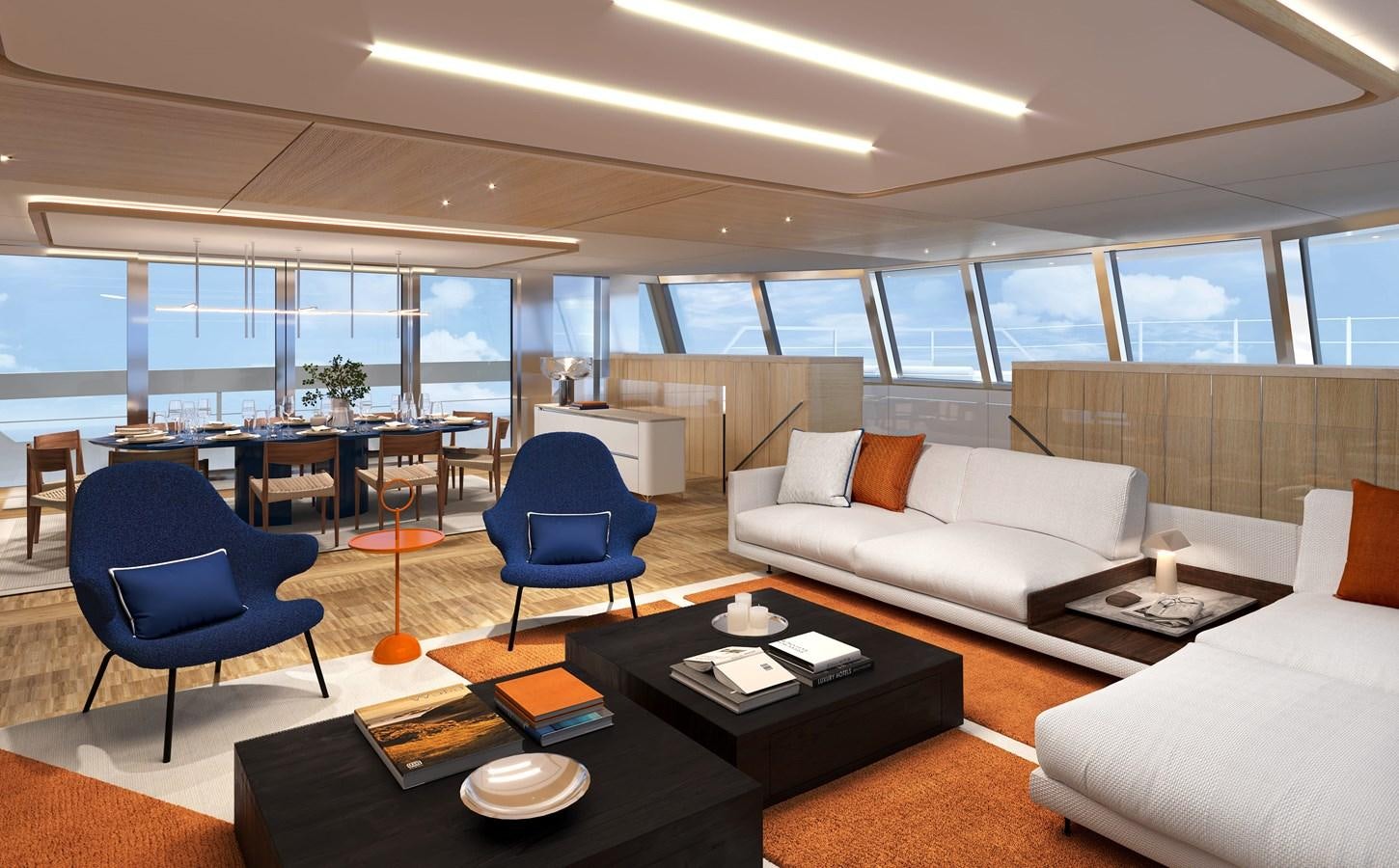 a living room with a couch and a table aboard SILVERCAT SC22M Yacht for Sale