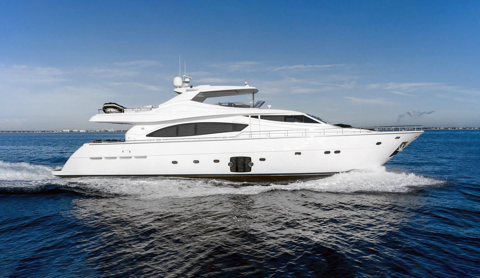 a white yacht on the water aboard NACL Yacht for Sale