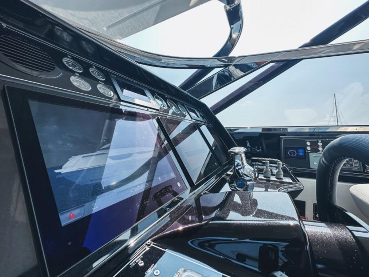 the interior of a car aboard NO Yacht for Sale