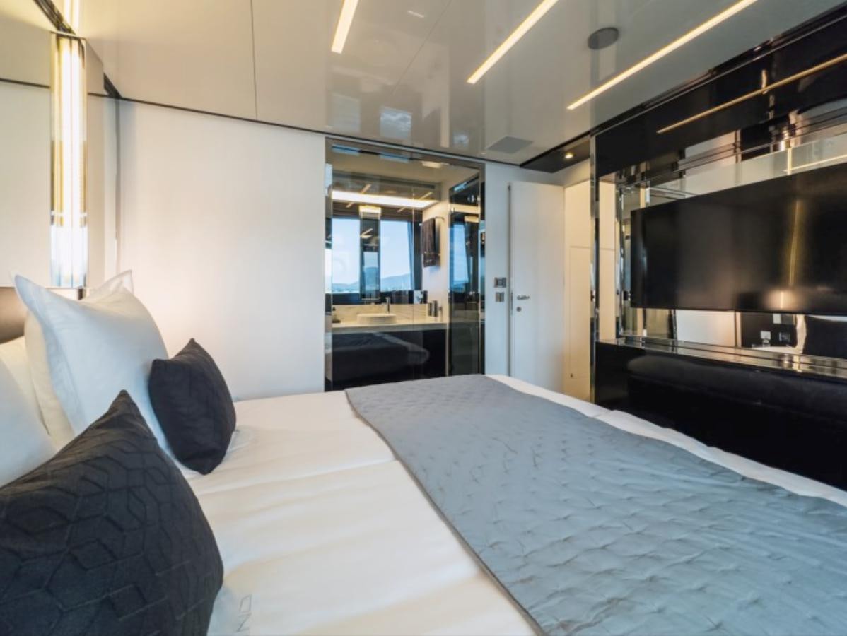 a bed in a room aboard NO Yacht for Sale