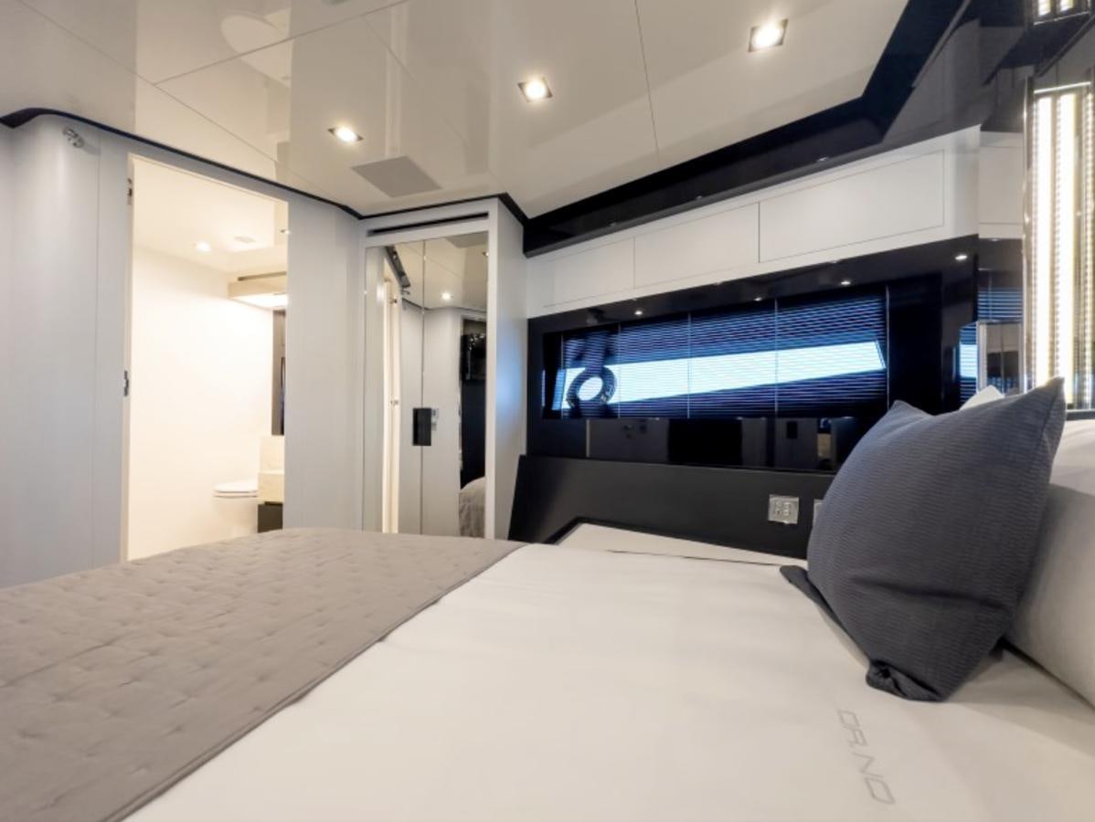 a large flat screen television in a room aboard NO Yacht for Sale