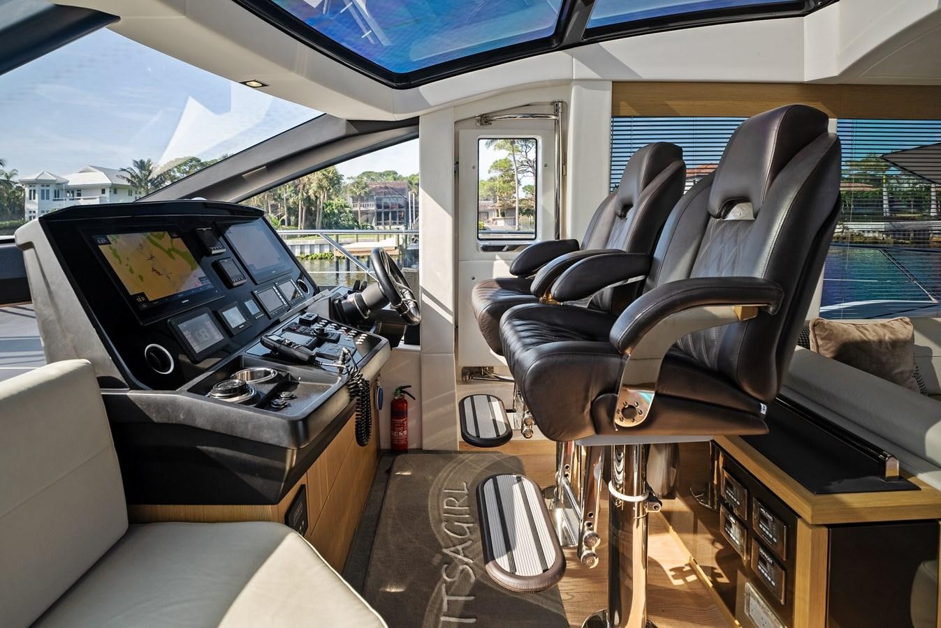 a car with a seat open aboard IT'S A GIRL Yacht for Sale