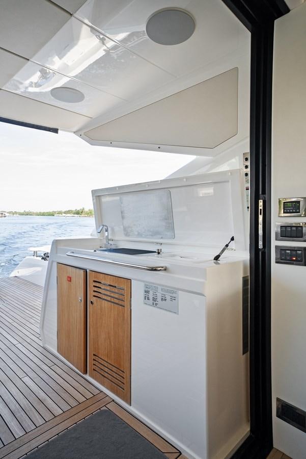 a kitchen with a microwave oven aboard IT'S A GIRL Yacht for Sale
