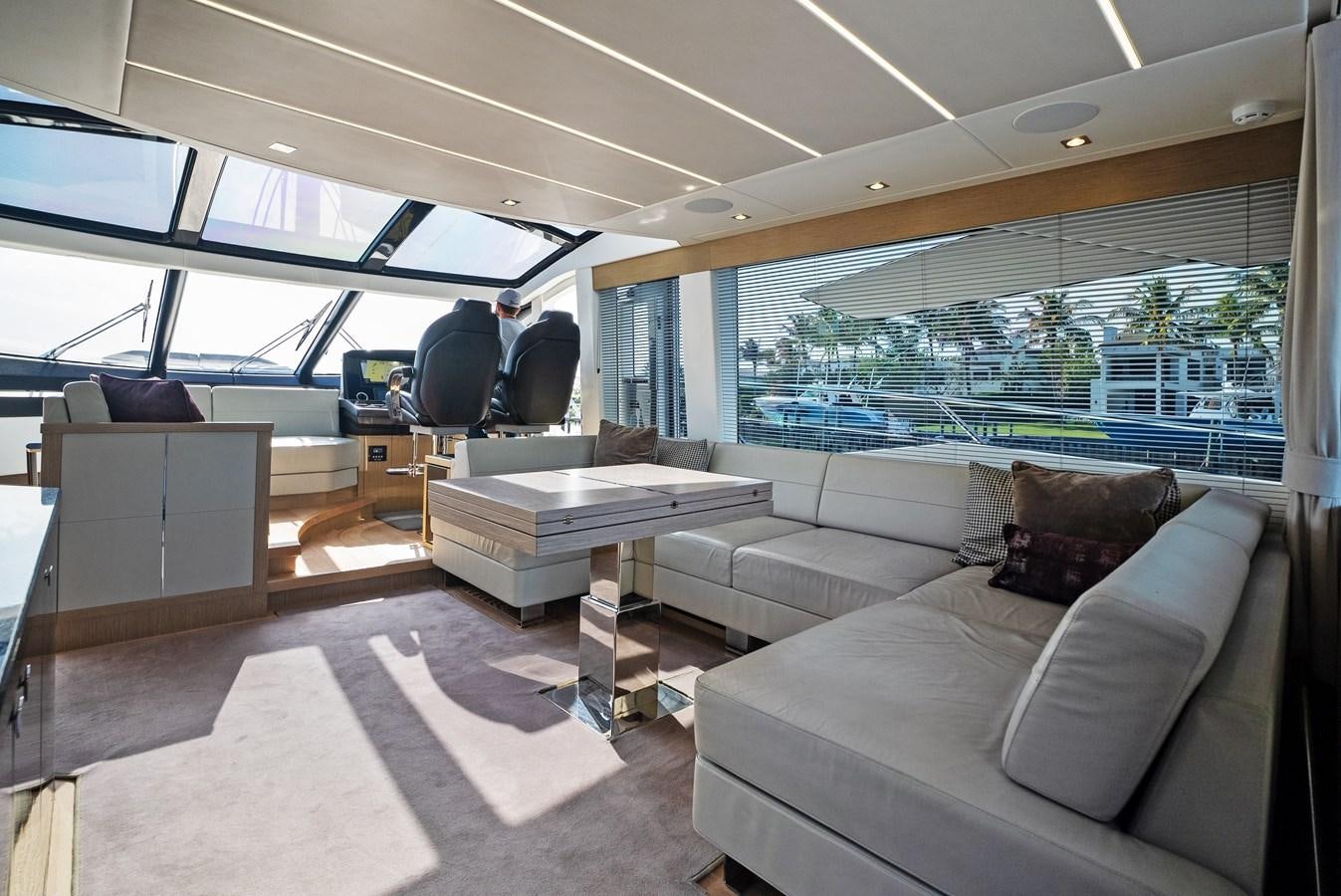 a room with a couch and a table aboard IT'S A GIRL Yacht for Sale