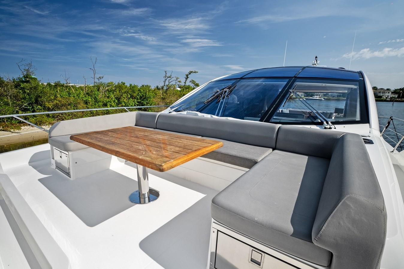 a car with a table on the back aboard IT'S A GIRL Yacht for Sale