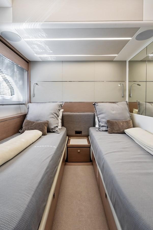 a room with two beds aboard IT'S A GIRL Yacht for Sale