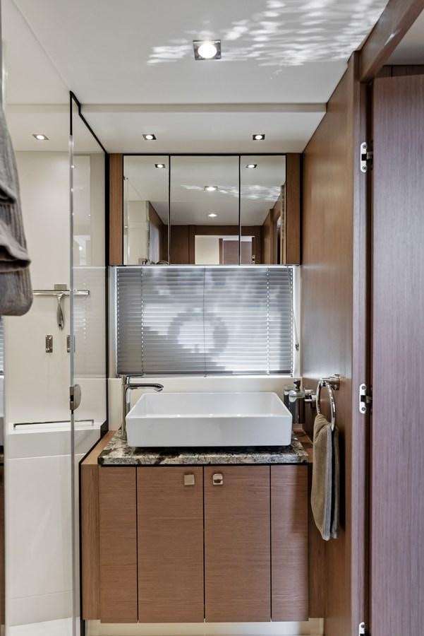 a kitchen with a sink and a microwave aboard IT'S A GIRL Yacht for Sale