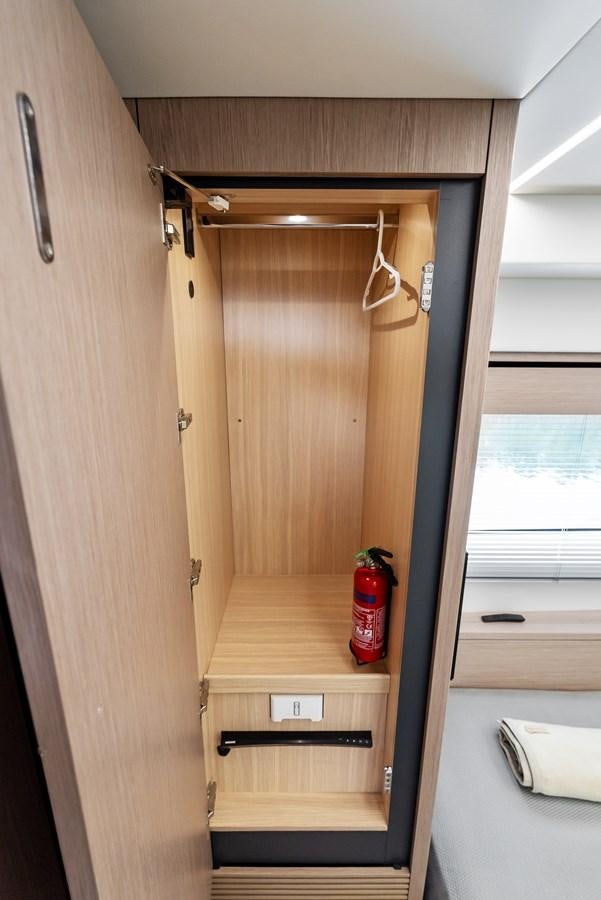 a wood cabinet in a room aboard IT'S A GIRL Yacht for Sale