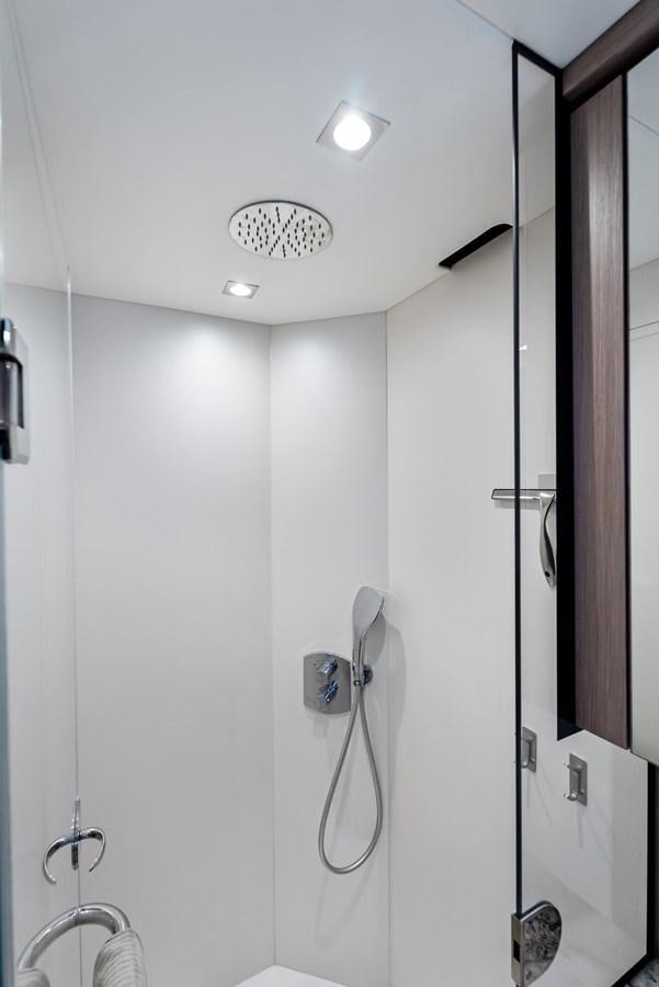 a shower with a mirror aboard IT'S A GIRL Yacht for Sale