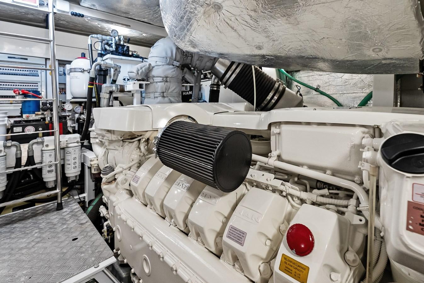 a machine with a black cap aboard IT'S A GIRL Yacht for Sale