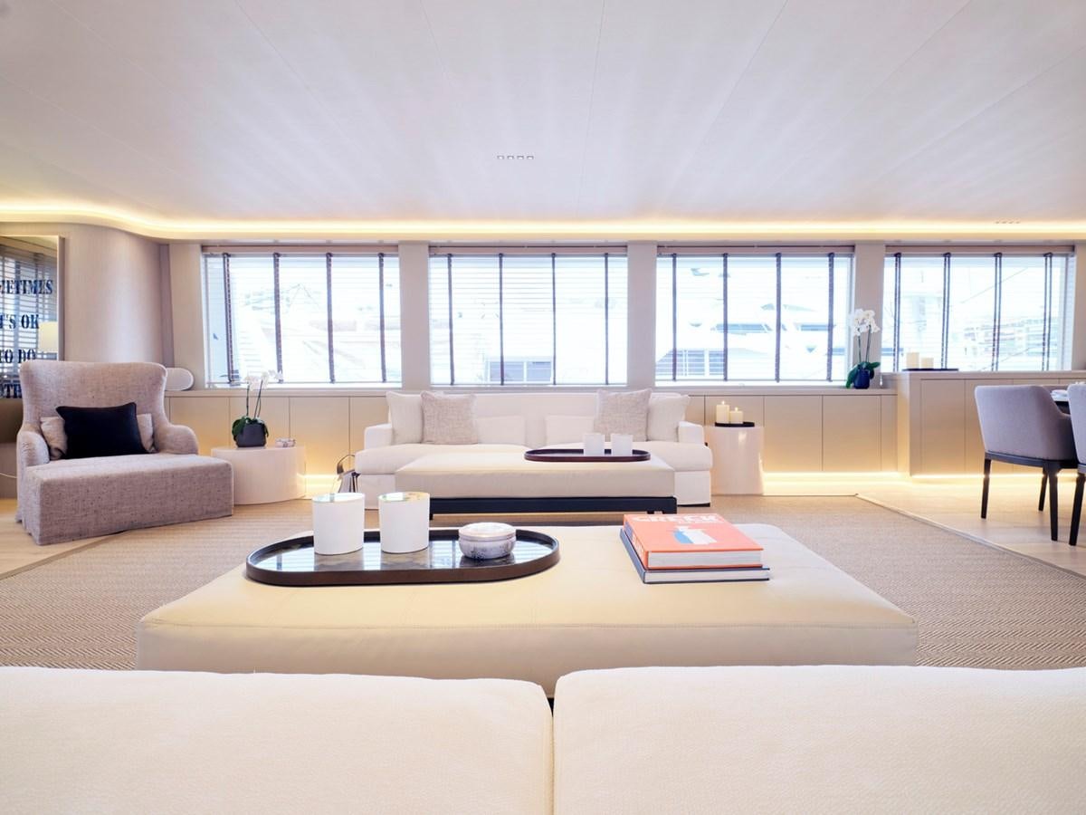 a living room with a large window aboard ENDLESS SUMMER Yacht for Sale