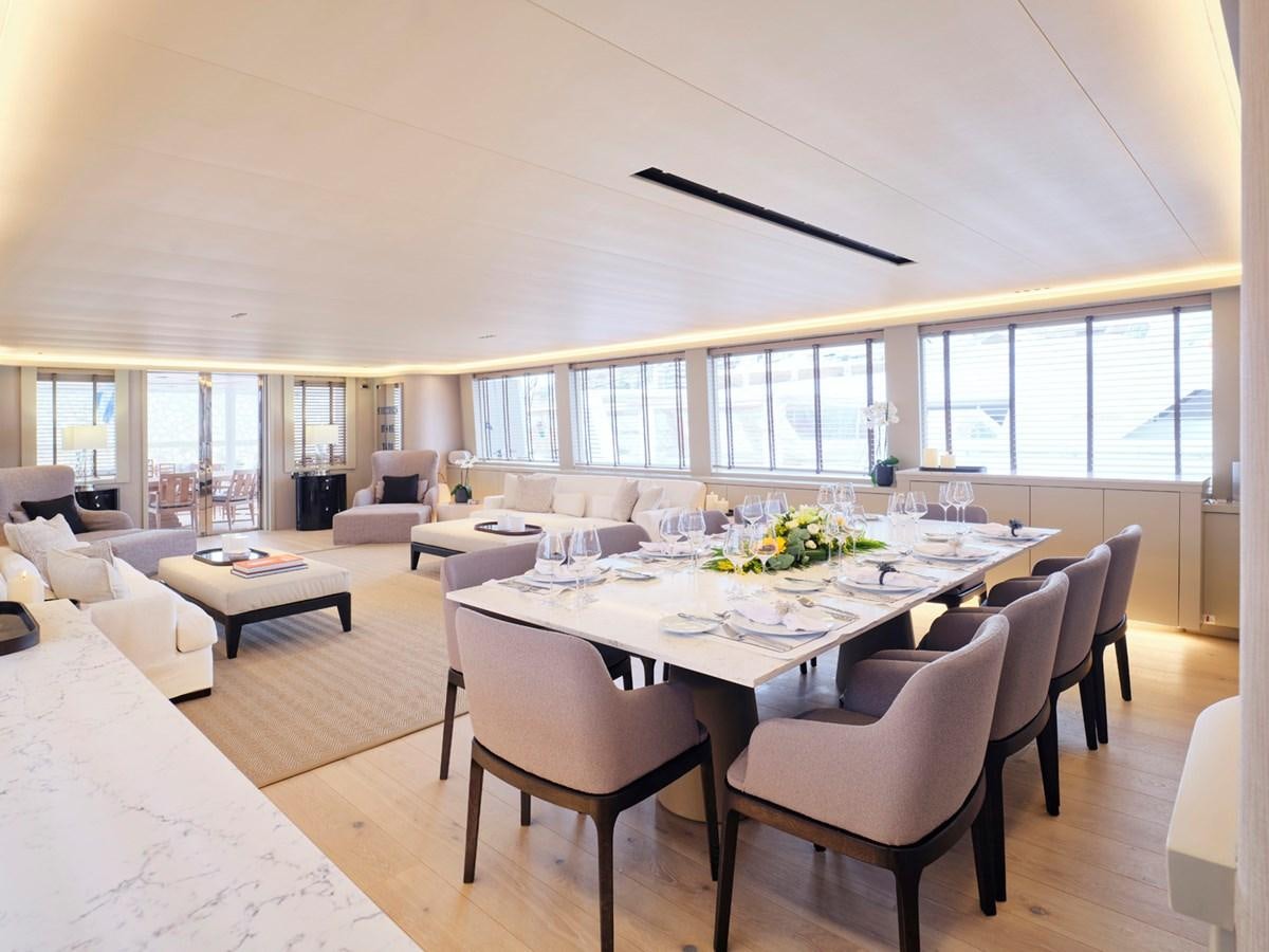a large dining room with a large table and chairs aboard ENDLESS SUMMER Yacht for Sale