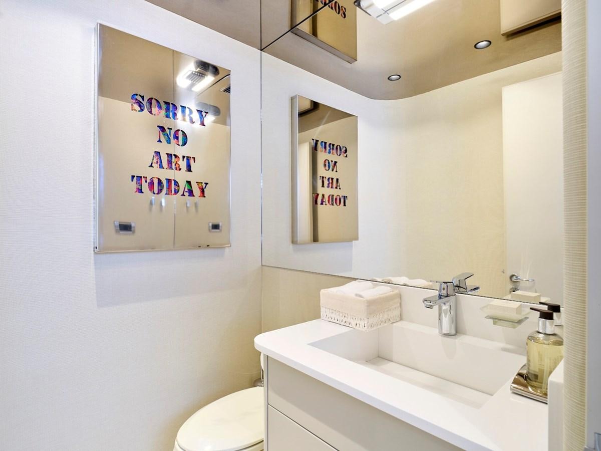 a bathroom with a sink and a toilet aboard ENDLESS SUMMER Yacht for Sale