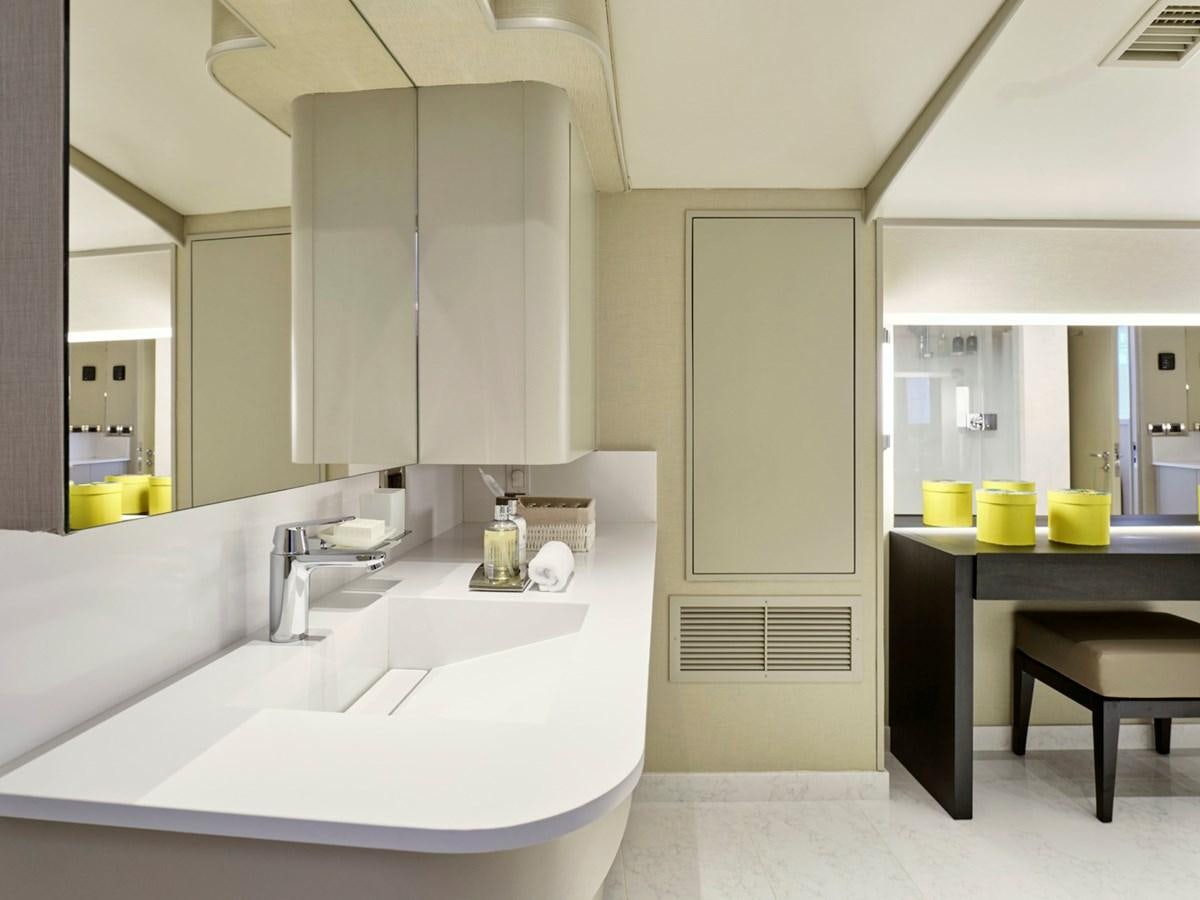 a bathroom with sinks and a mirror aboard ENDLESS SUMMER Yacht for Sale