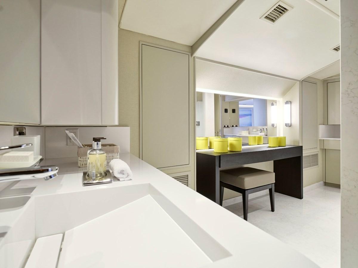 a kitchen with white cabinets aboard ENDLESS SUMMER Yacht for Sale