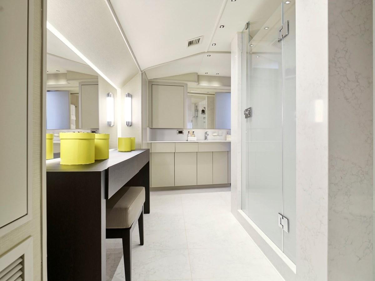 a kitchen with white cabinets aboard ENDLESS SUMMER Yacht for Sale