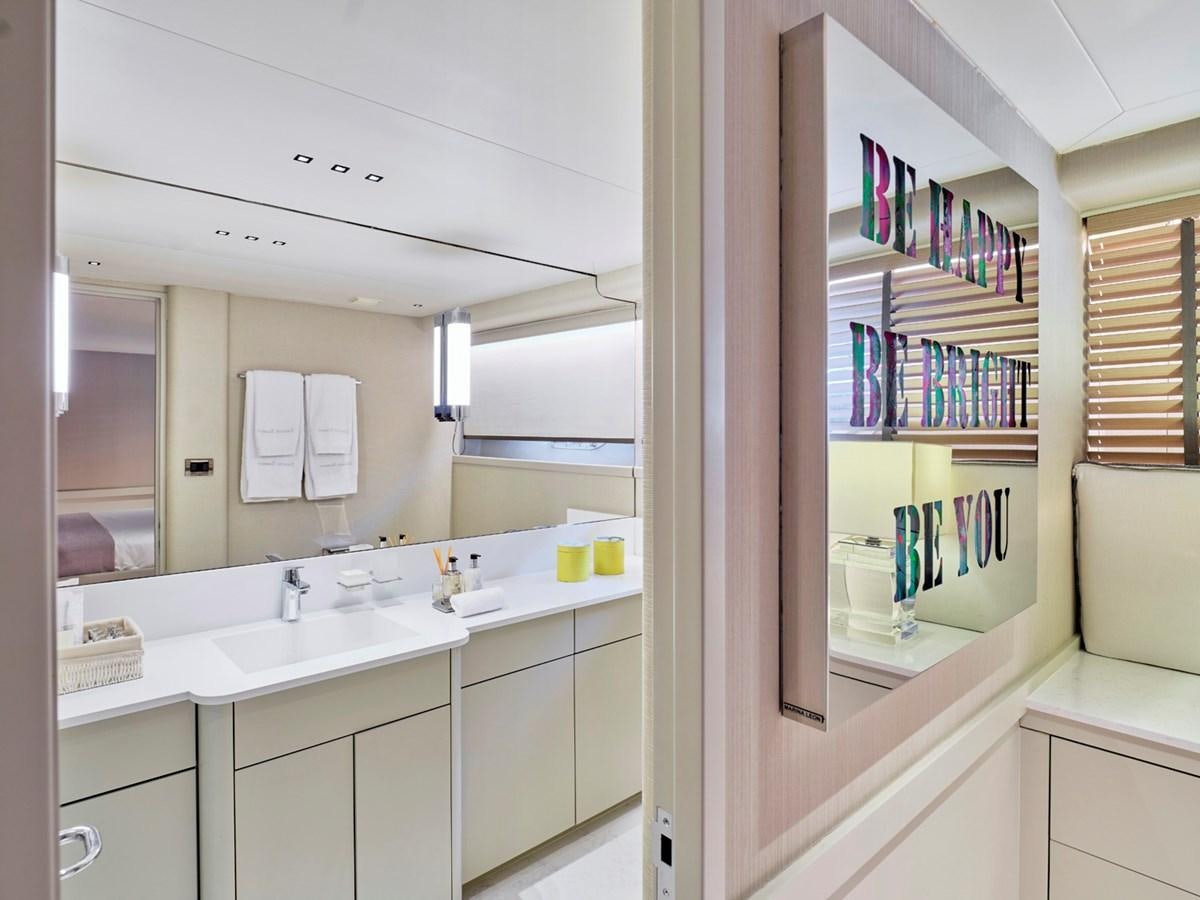 a bathroom with a large mirror aboard ENDLESS SUMMER Yacht for Sale
