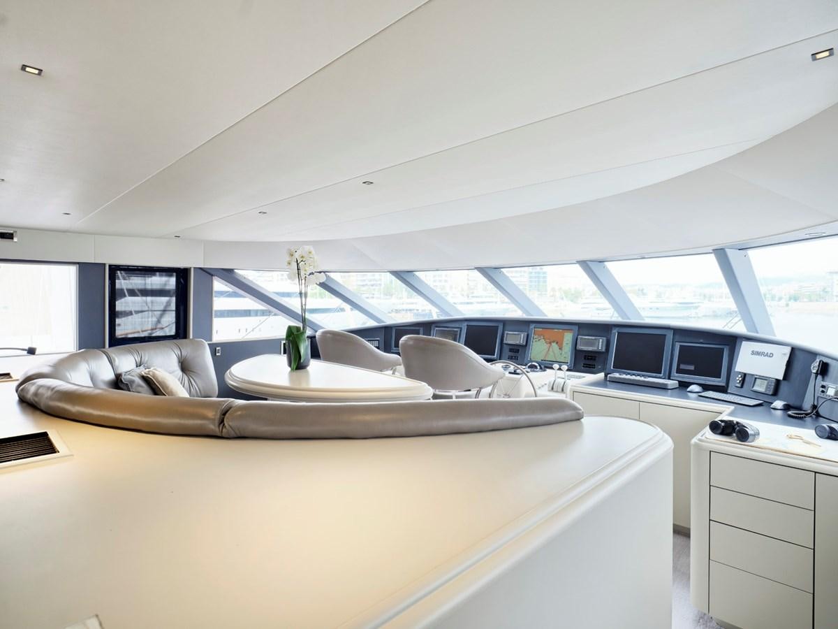 a room with a bed and a desk aboard ENDLESS SUMMER Yacht for Sale