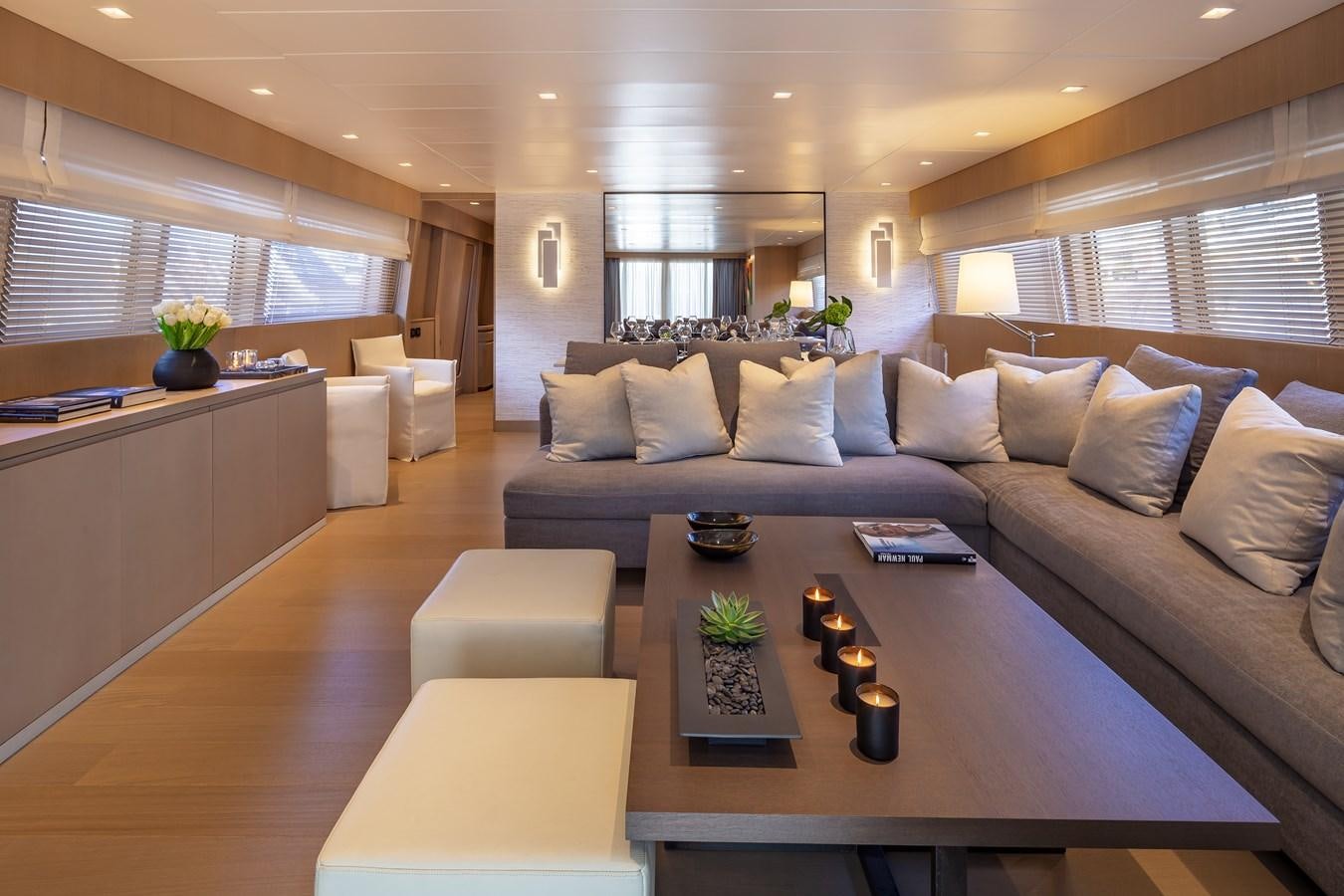 a living room with a couch and a coffee table aboard SUMMER FUN Yacht for Sale