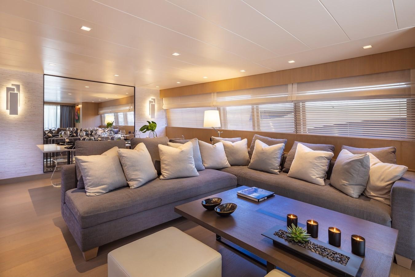 a living room with a couch and a coffee table aboard SUMMER FUN Yacht for Sale