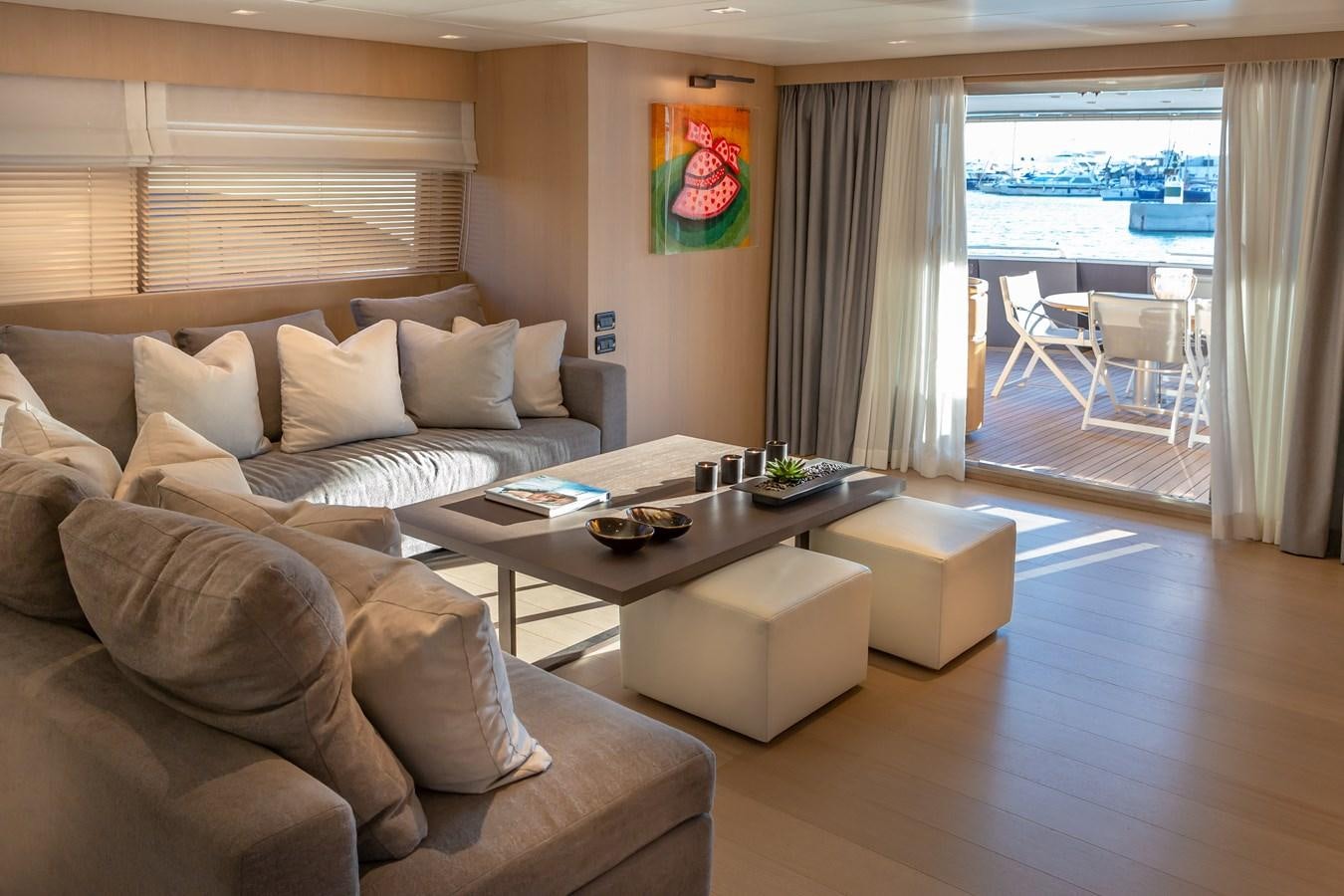 a living room with a large window aboard SUMMER FUN Yacht for Sale