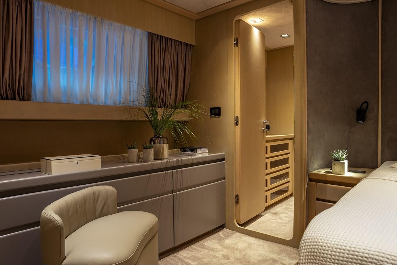 a room with a bed and a desk aboard SUMMER FUN Yacht for Sale