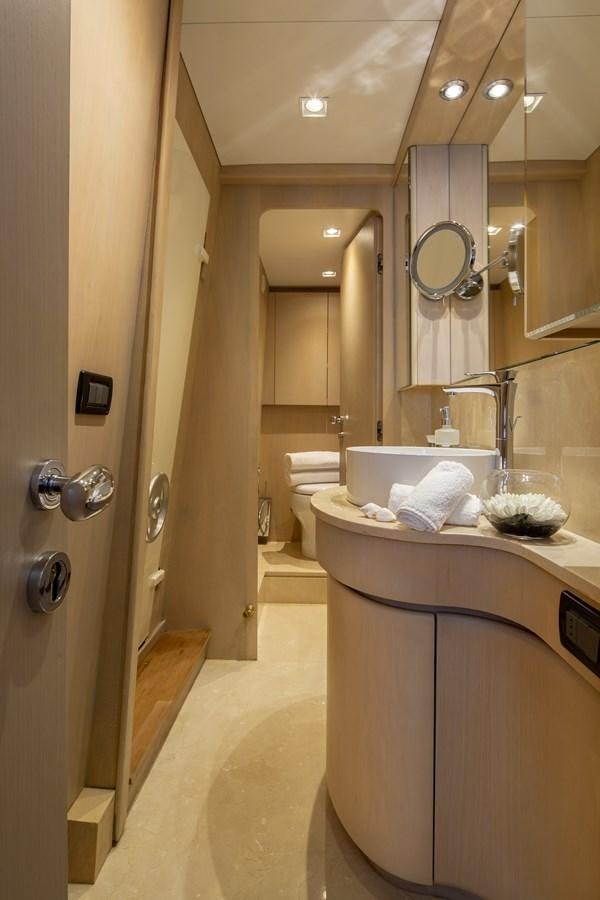 a bathroom with a sink and a mirror aboard SUMMER FUN Yacht for Sale
