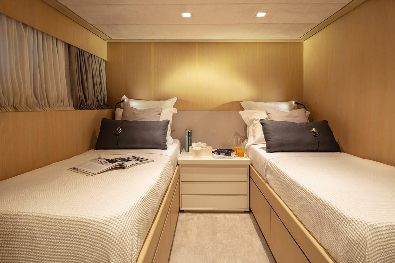 a room with two beds aboard SUMMER FUN Yacht for Sale