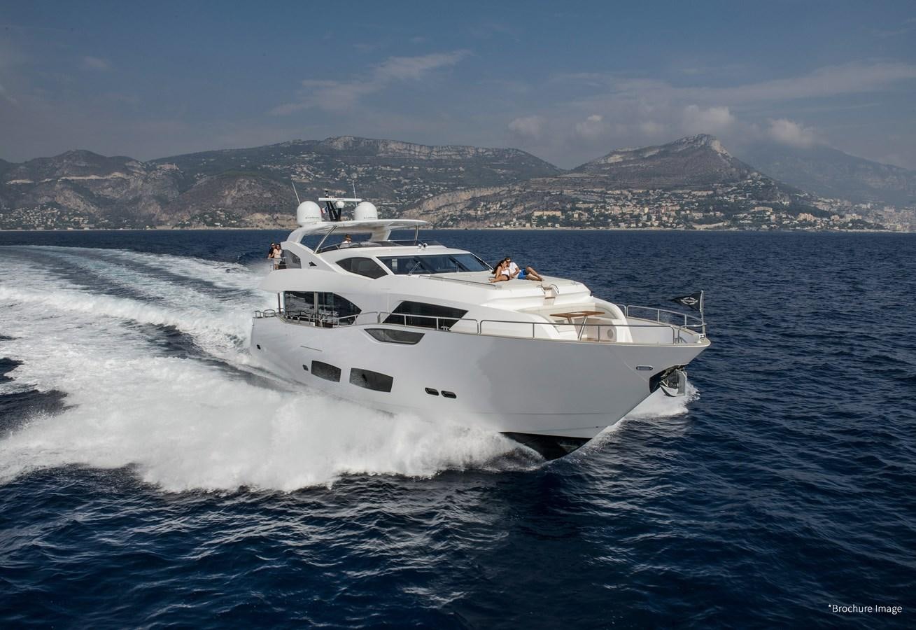 a white yacht on the water aboard LADY M Yacht for Sale