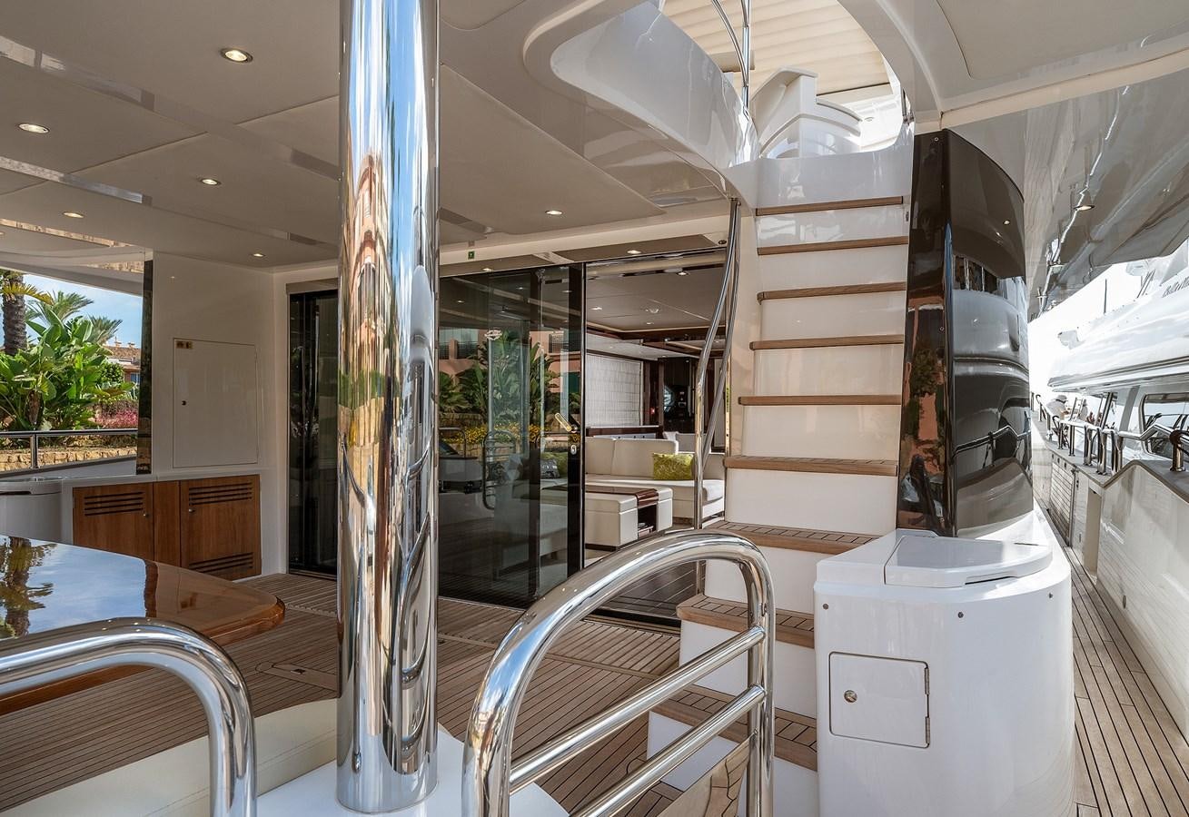 a large glass display case in a building aboard LADY M Yacht for Sale