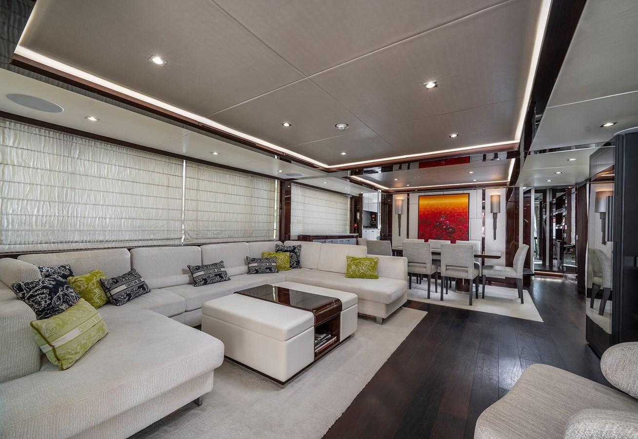 a living room with a large window aboard LADY M Yacht for Sale