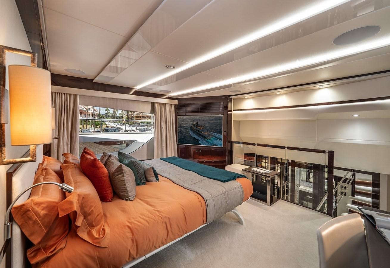 a bedroom with a large bed aboard LADY M Yacht for Sale