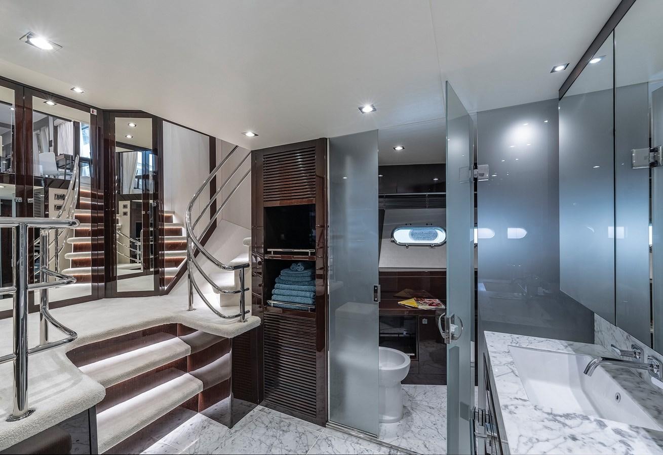 a bathroom with a tub and a sink aboard LADY M Yacht for Sale