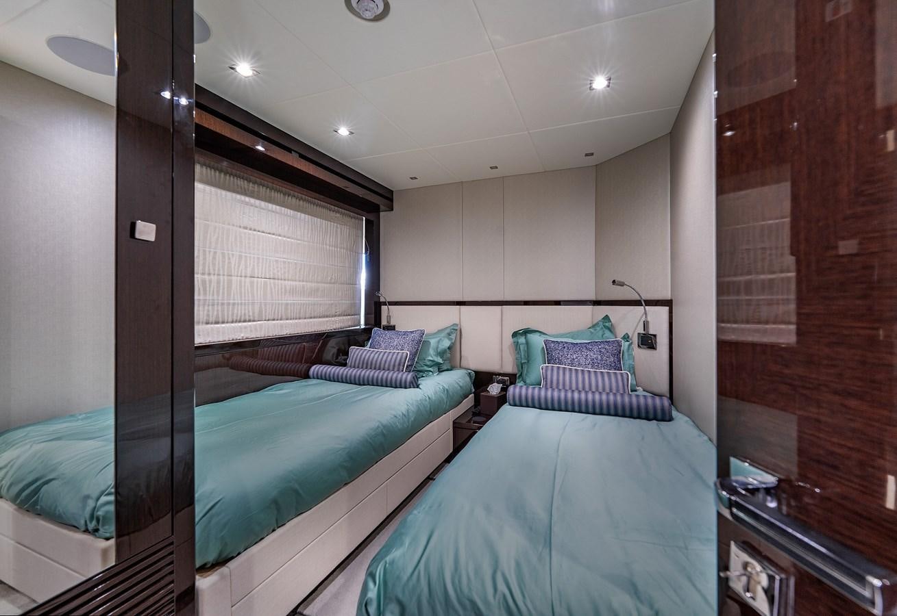 a couple of beds in a hotel room aboard LADY M Yacht for Sale