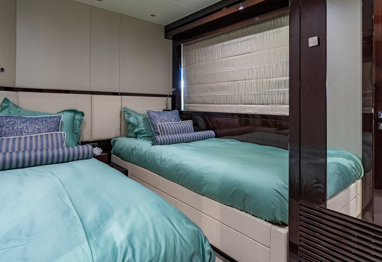 a couple of beds in a room aboard LADY M Yacht for Sale
