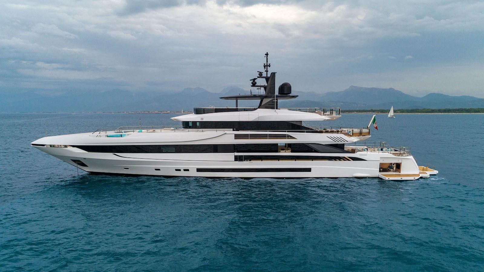 a large white yacht in the water aboard MAVERICK Yacht for Sale