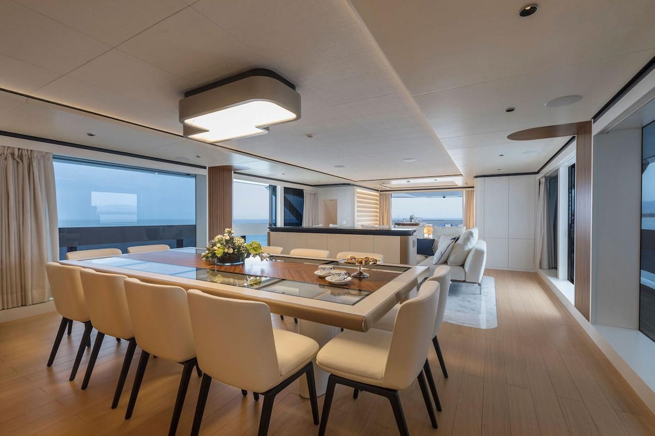 a large conference room with a table and chairs aboard MAVERICK Yacht for Sale