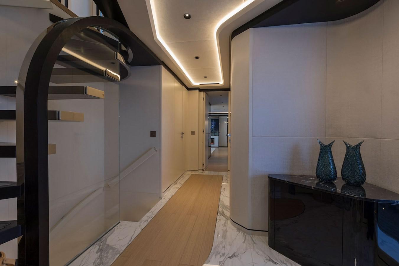 a room with a table and vases aboard MAVERICK Yacht for Sale