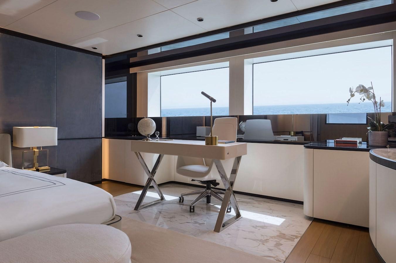 a room with a desk and a chair aboard MAVERICK Yacht for Sale