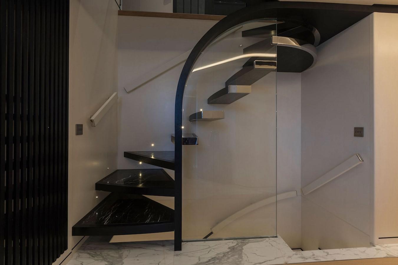a metal staircase in a room aboard MAVERICK Yacht for Sale