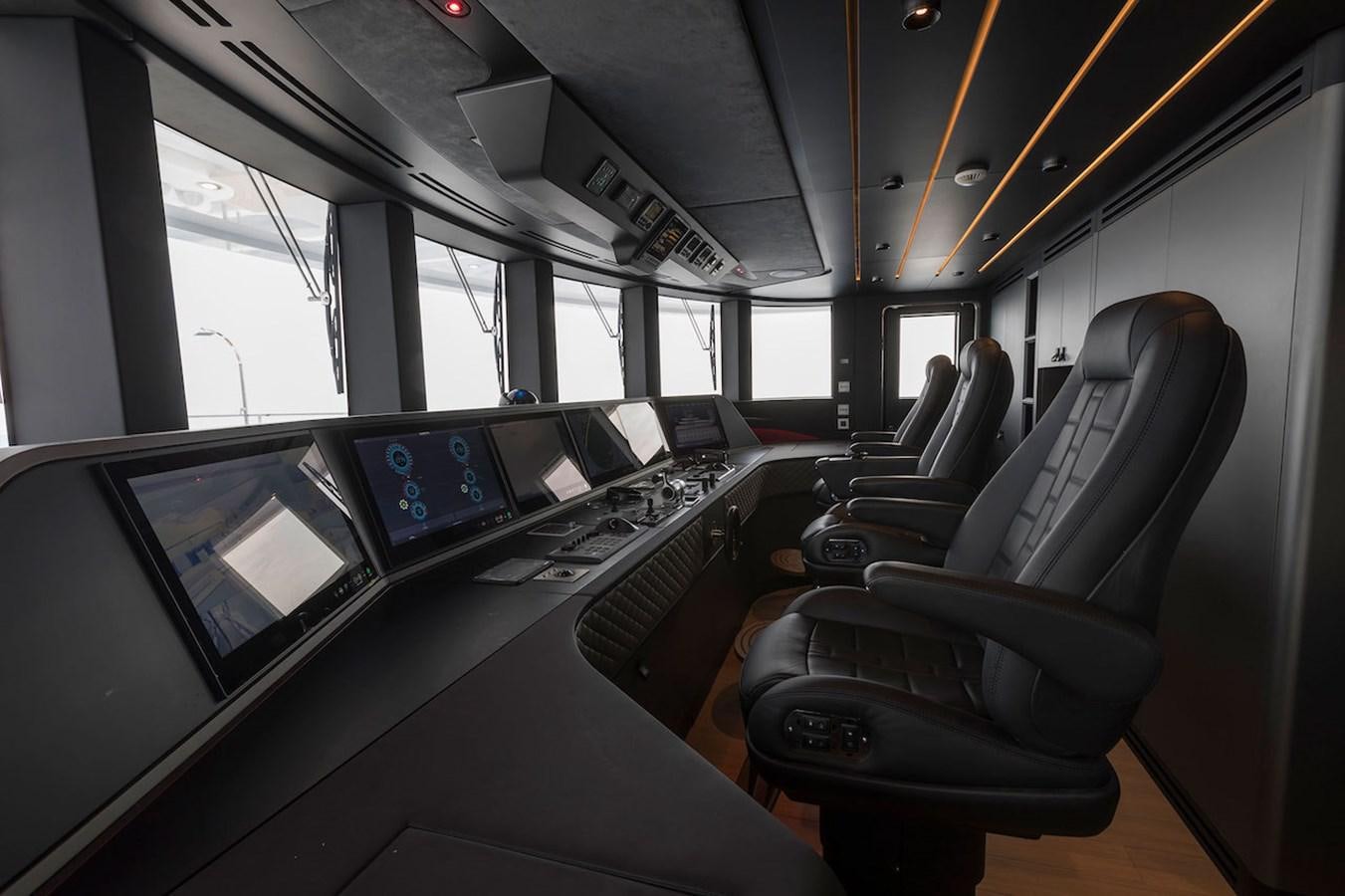 inside of a vehicle with a screen and a seat and a steering wheel aboard MAVERICK Yacht for Sale