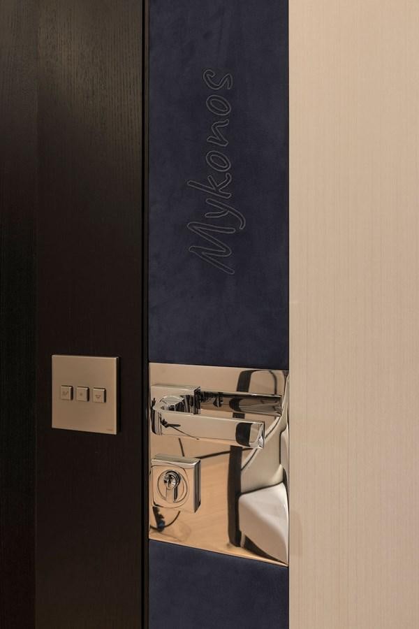 a door with a handle aboard MAVERICK Yacht for Sale