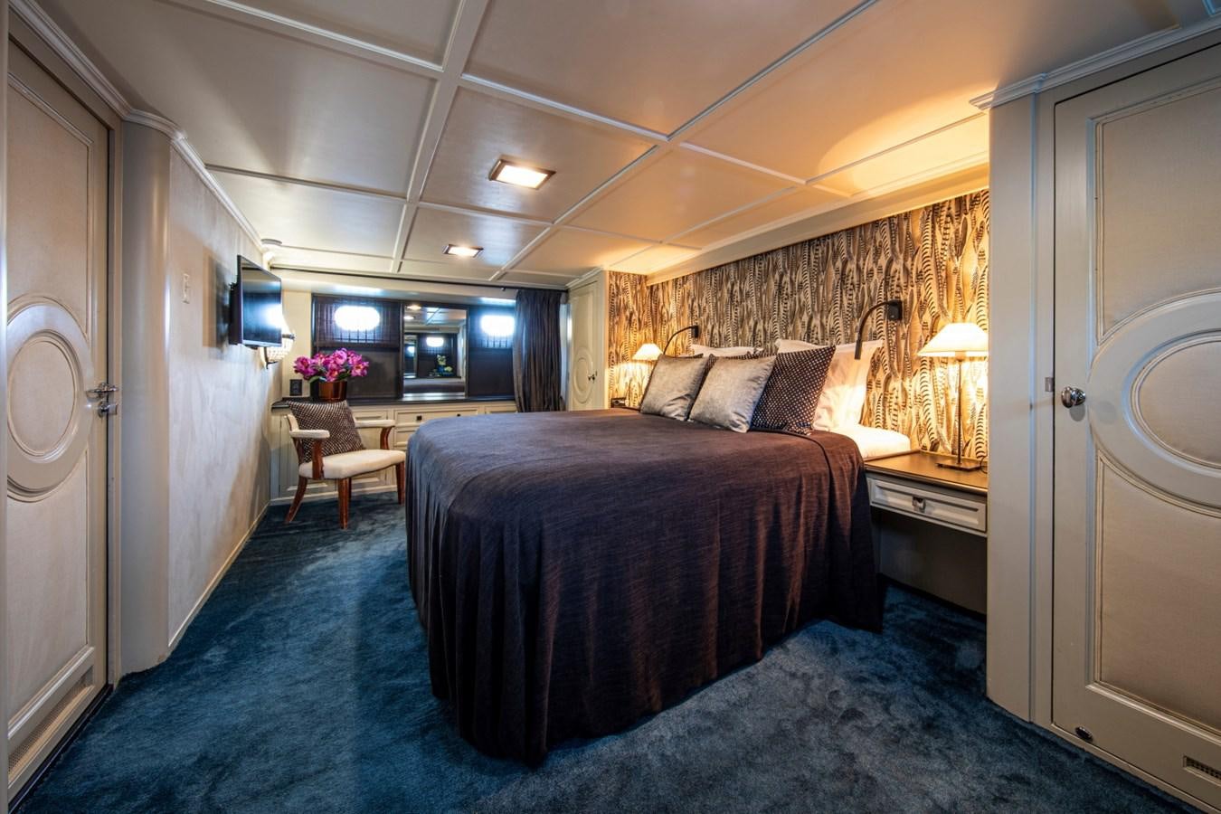 a bed in a room aboard SANTA MARIA Yacht for Sale