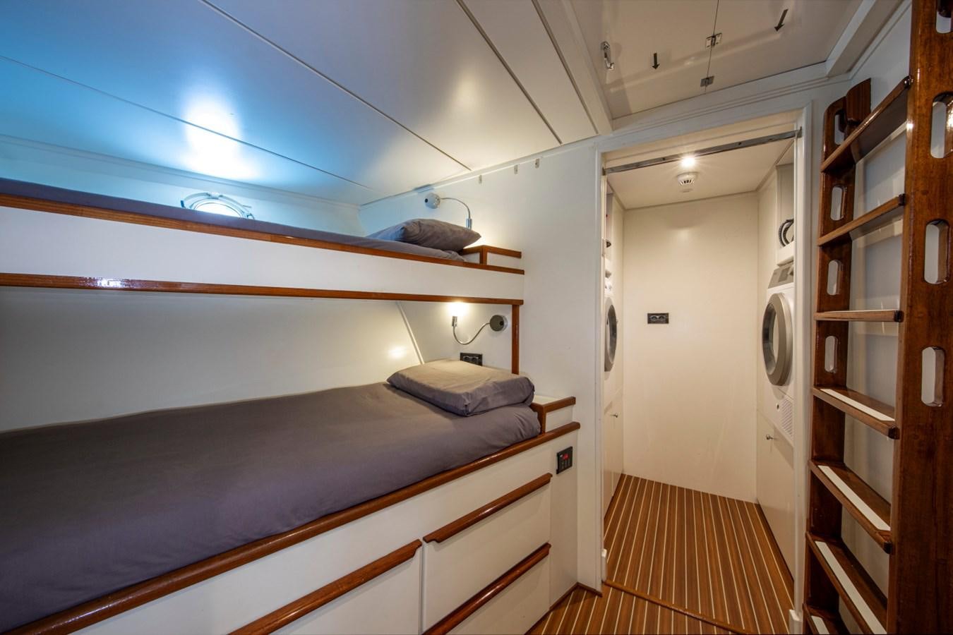 a room with a bed and a shelf aboard SANTA MARIA Yacht for Sale