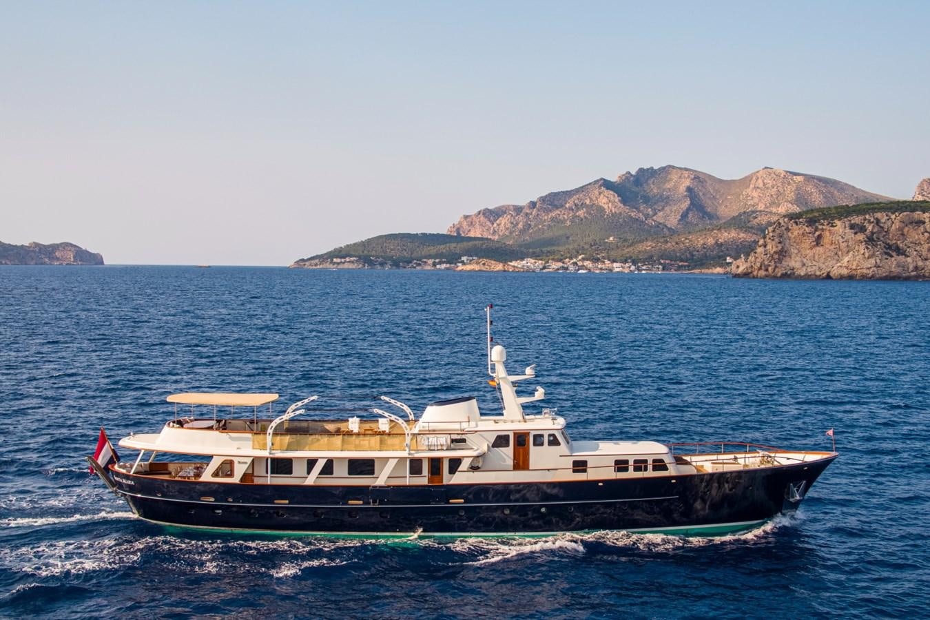 a boat on the water aboard SANTA MARIA Yacht for Sale