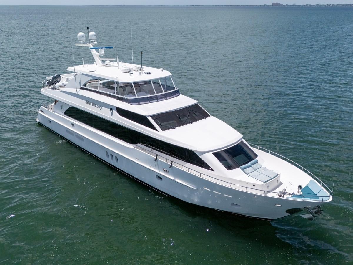 a white yacht in the water aboard 101' HARGRAVE Yacht for Sale